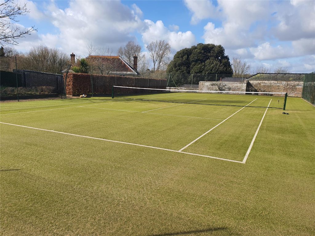 Tennis court service completed looking fresh and improved playability