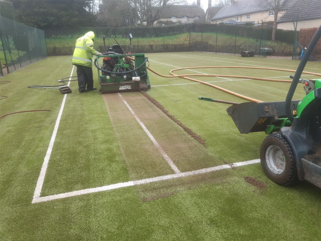 Rejuvenation clean on tennis court in need of a service