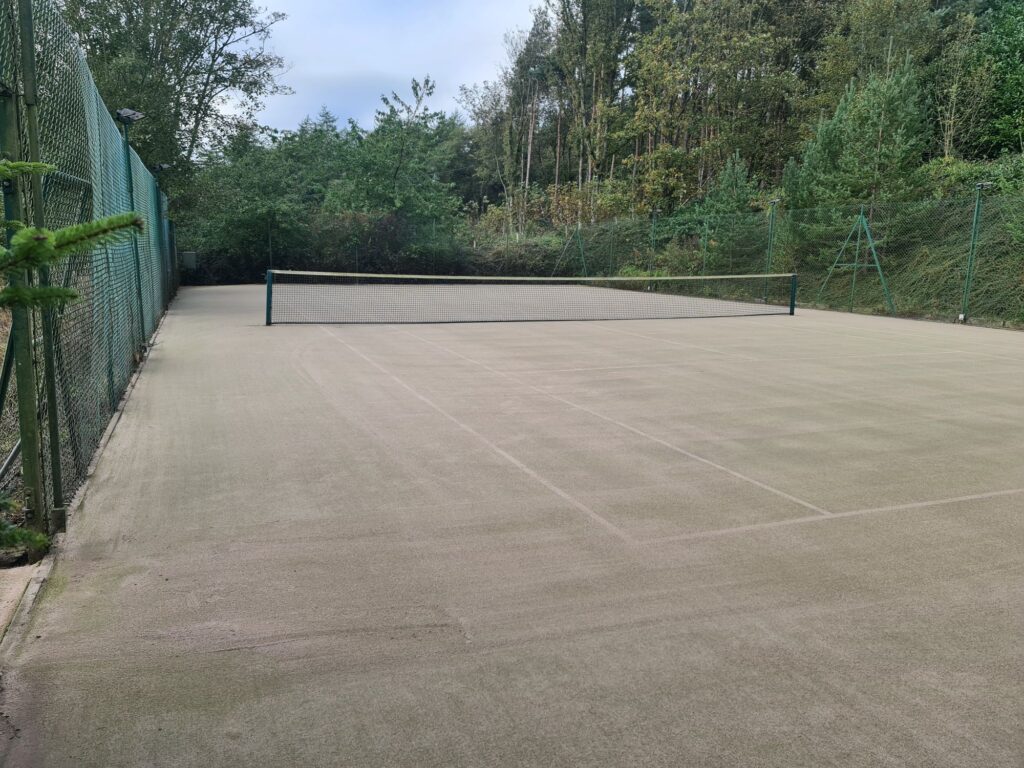 tennis court after sand application